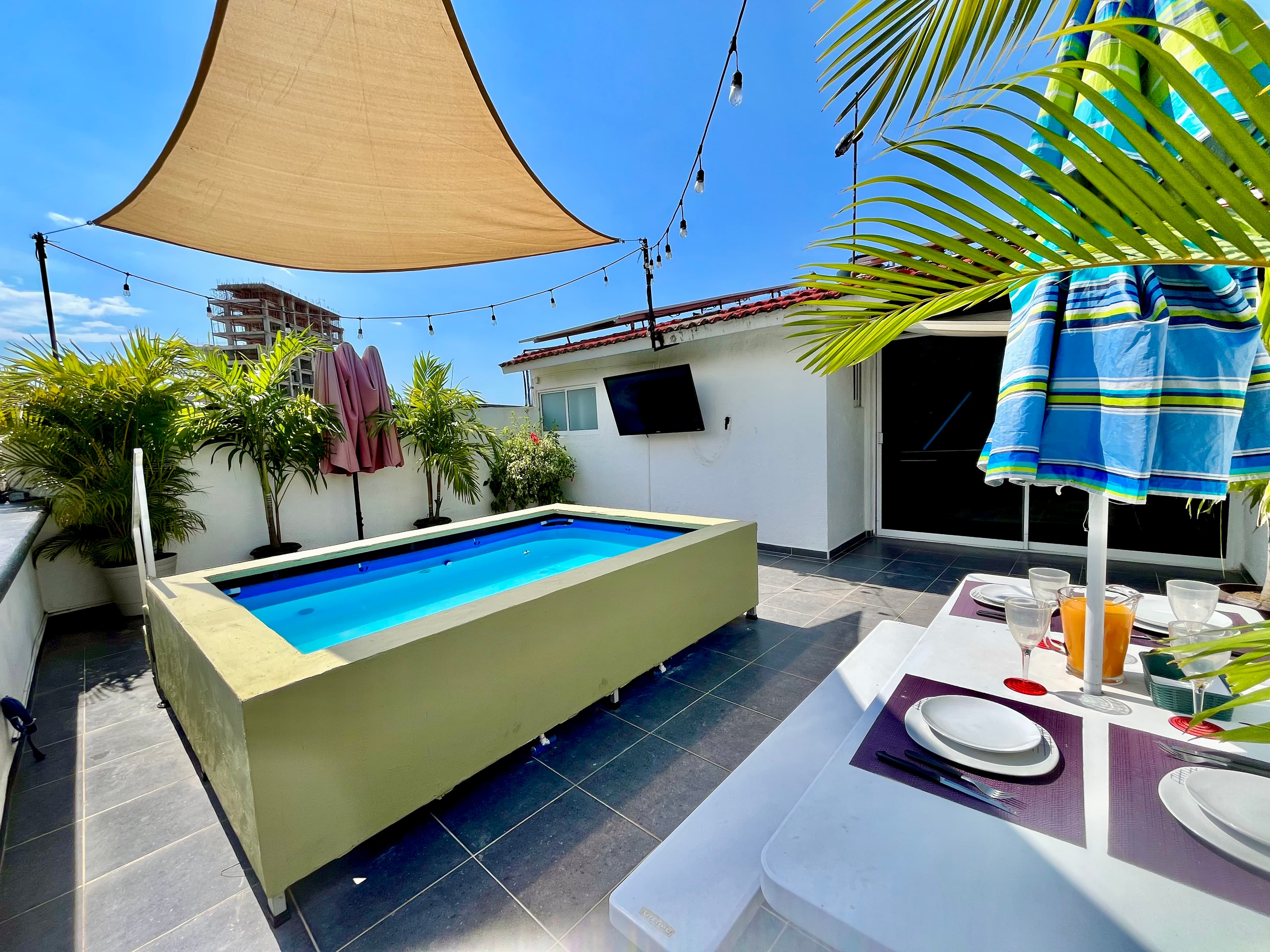 Terrace, outdoor dining, and private plunge pool at Aralias