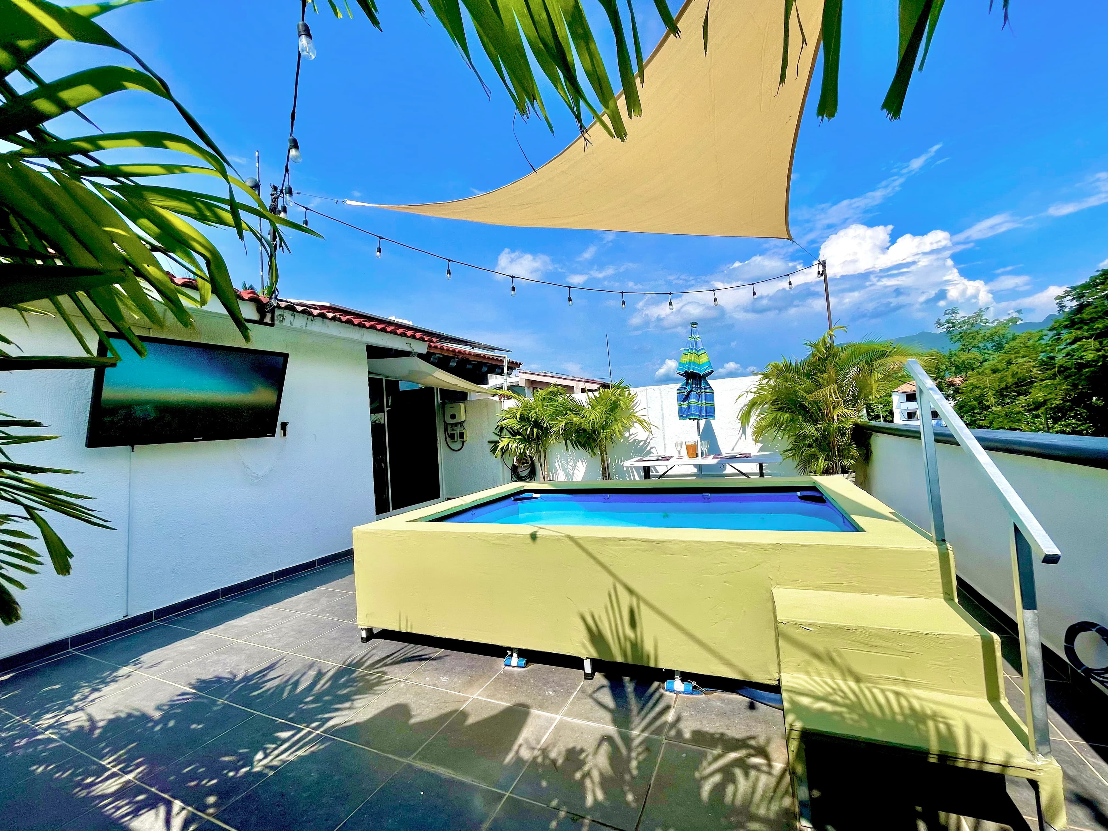 Private plunge pool and outdoor TV at Aralias