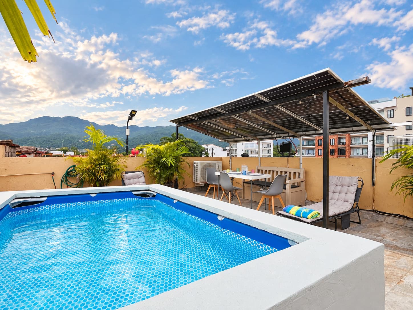 Private plunge pool, shaded roof, and mountain view at Versalles 837