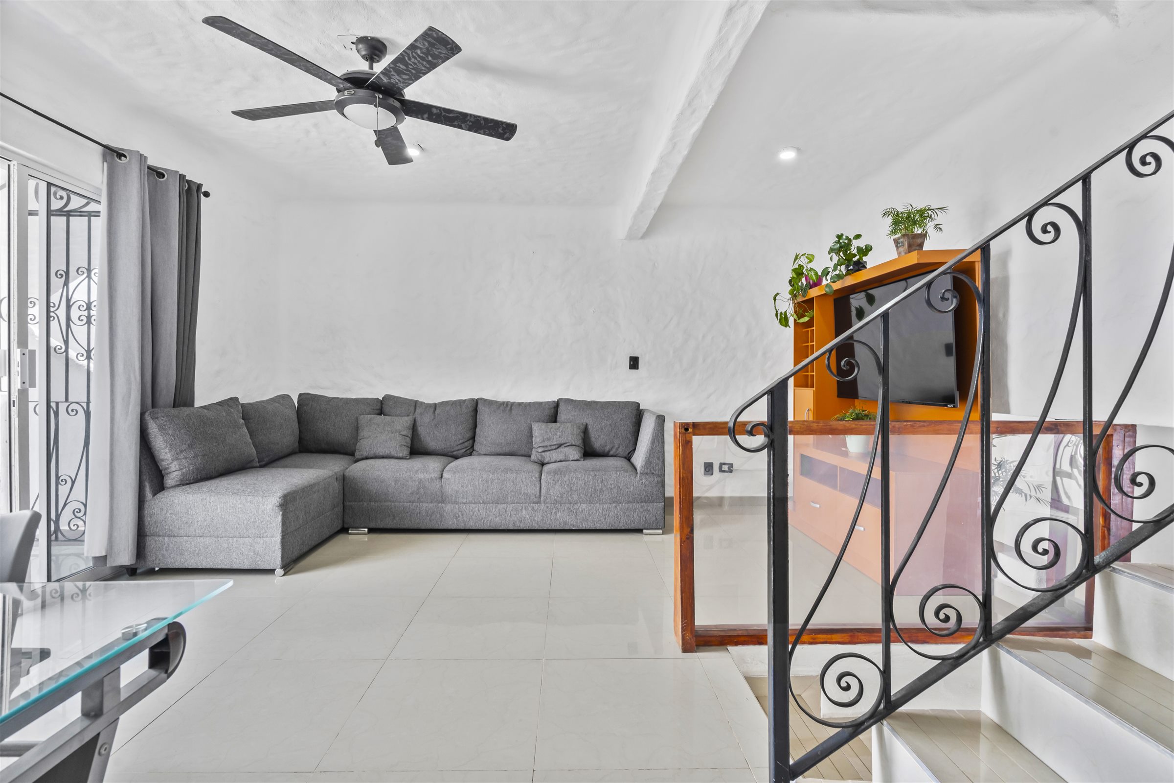 Mangos lounge beside the interior stairs